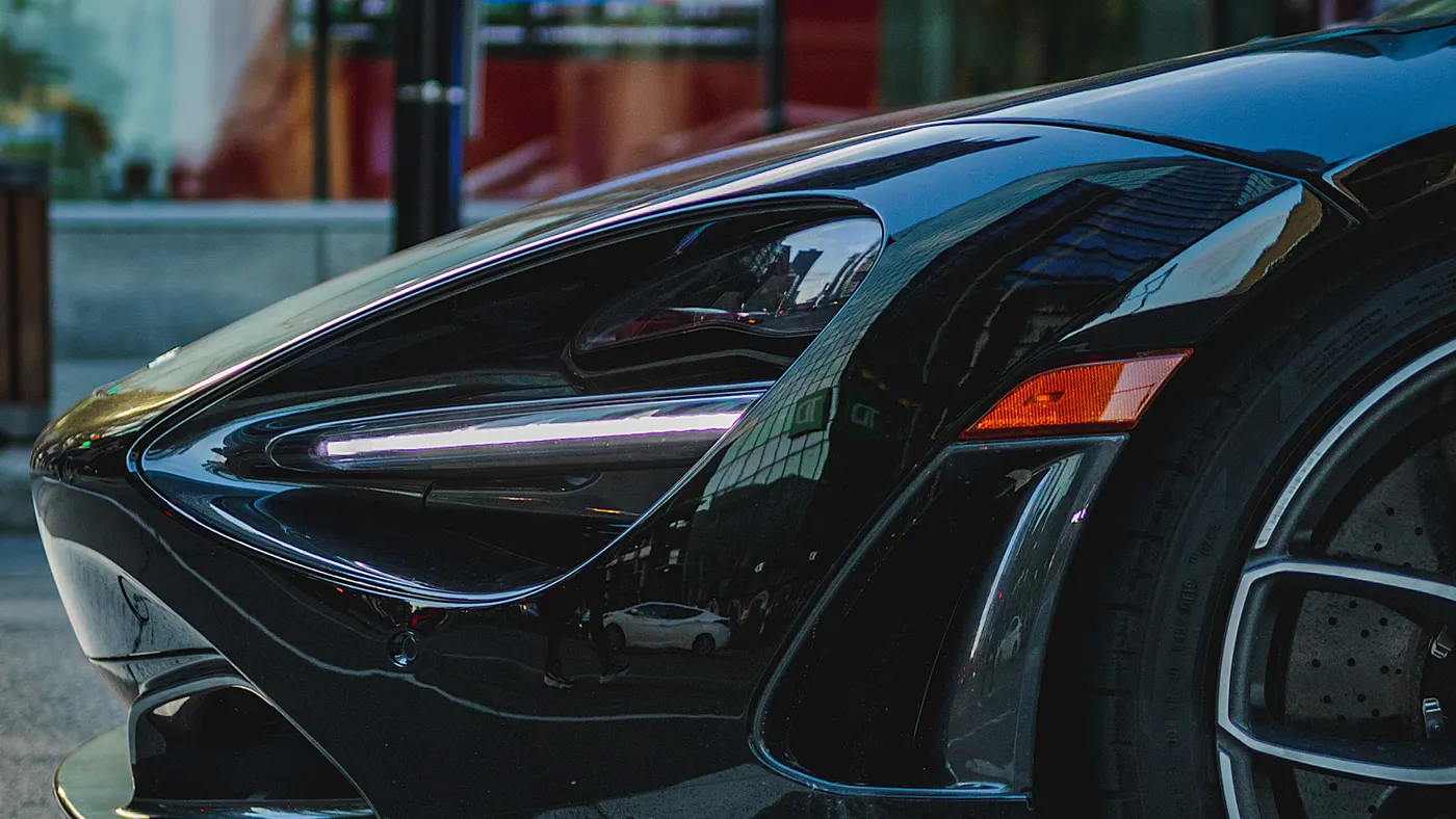 Blacked-out McLaren 720S front detail — Project Obsidian